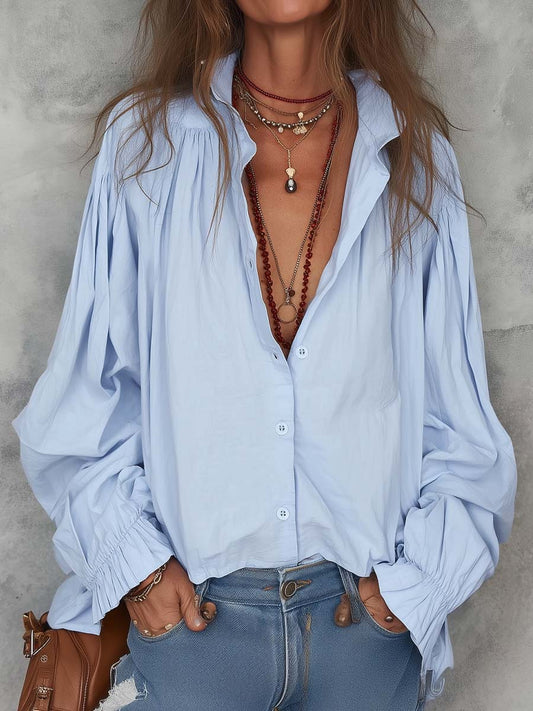 Blusa de Algodón con Puños de Volantes – Elegante y Versátil